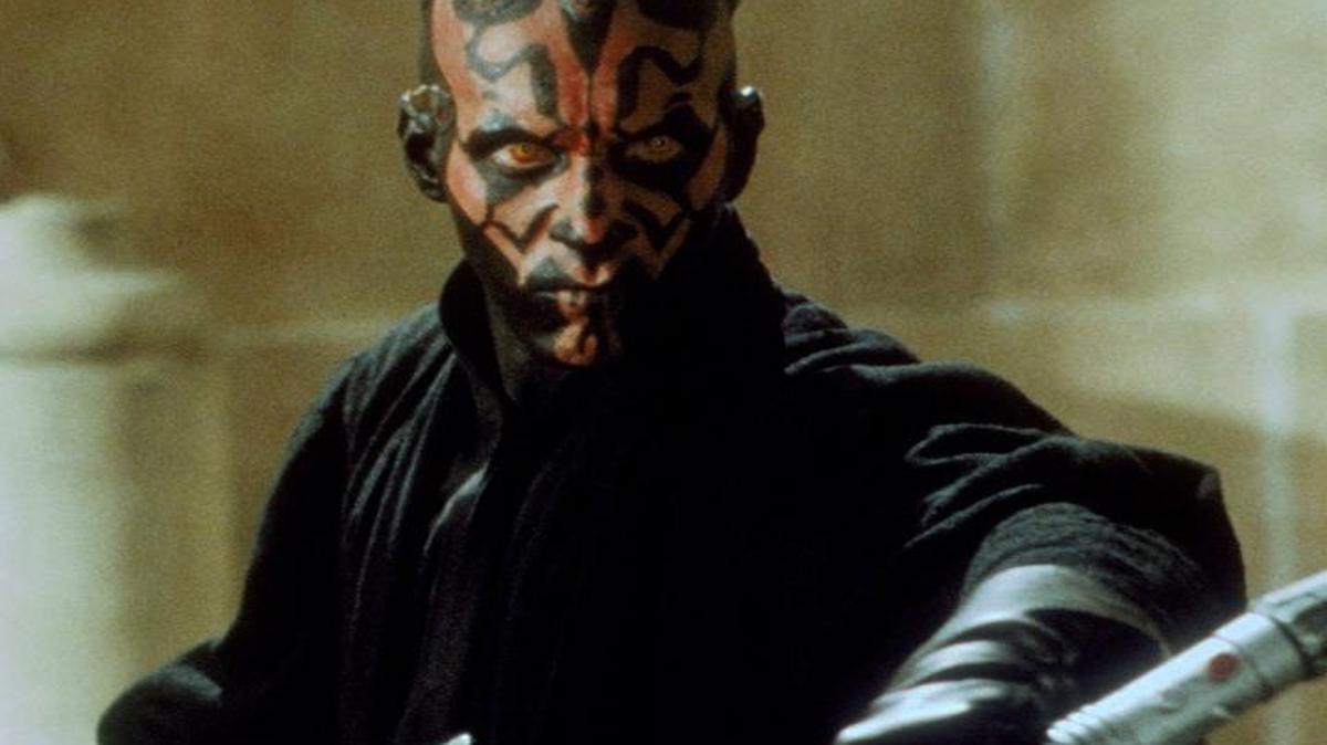 
Powerful Sith Lord Darth Maul (Ray Park) gets ready to take on two Jedi in the Theed main hangar.
