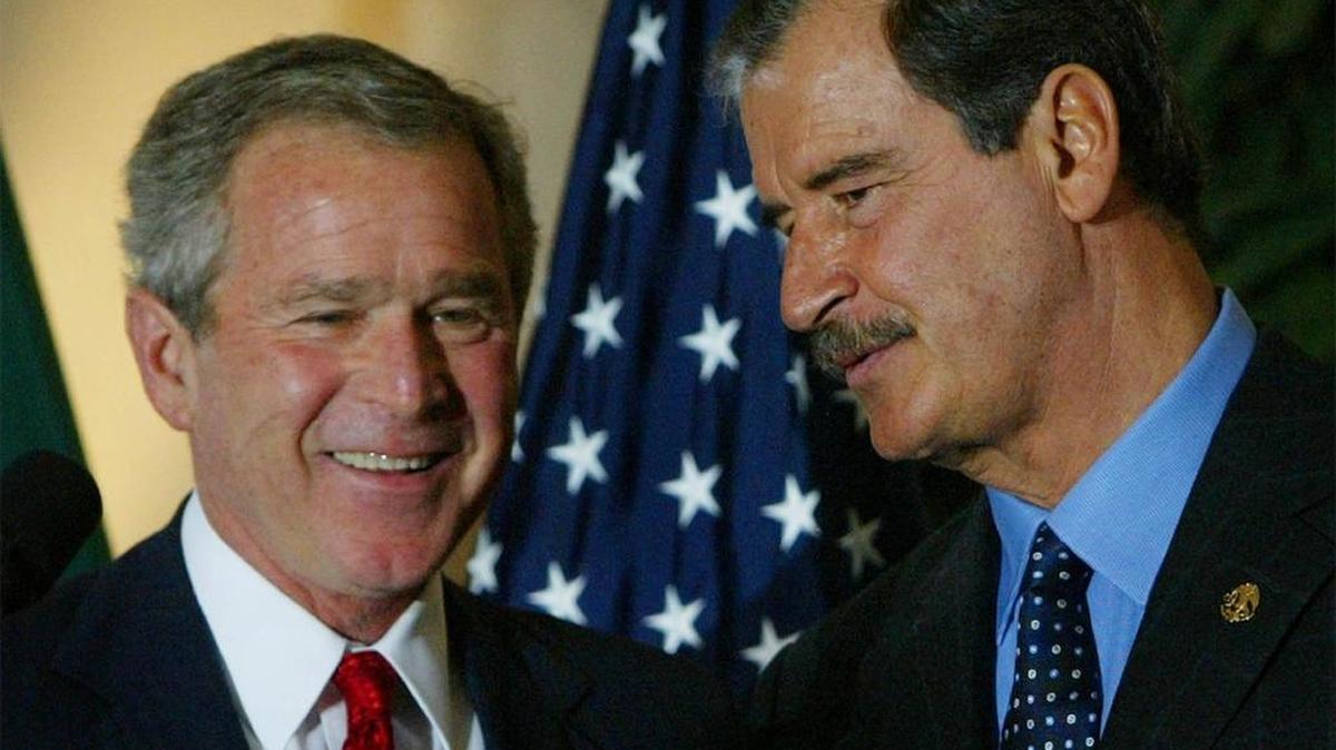 President George W. Bush speaks with Mexican President Vicente Fox, right, following a press conference during the Summit of the Americas in Monterrey, Mexico, in 2004.