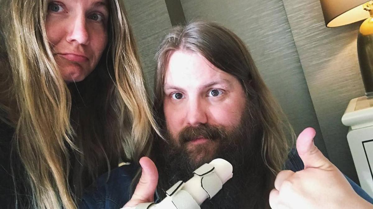 Country singer Chris Stapleton said a broken bone and a detached tendon in right index finger forced him to postpone “The All-American Road Show,” which included a showing Thursday in Fresno.
