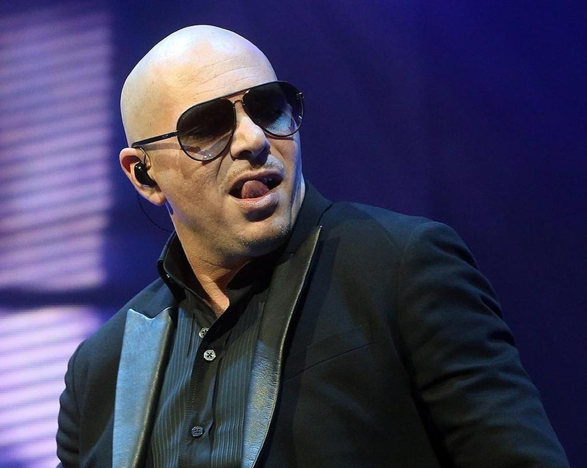 Pitbull and Enrique Iglesias share the stage at Save Mart Center.
