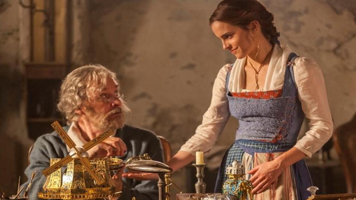 Emma Watson as Belle and Kevin Kline as Maurice in a scene from “Beauty and the Beast.”