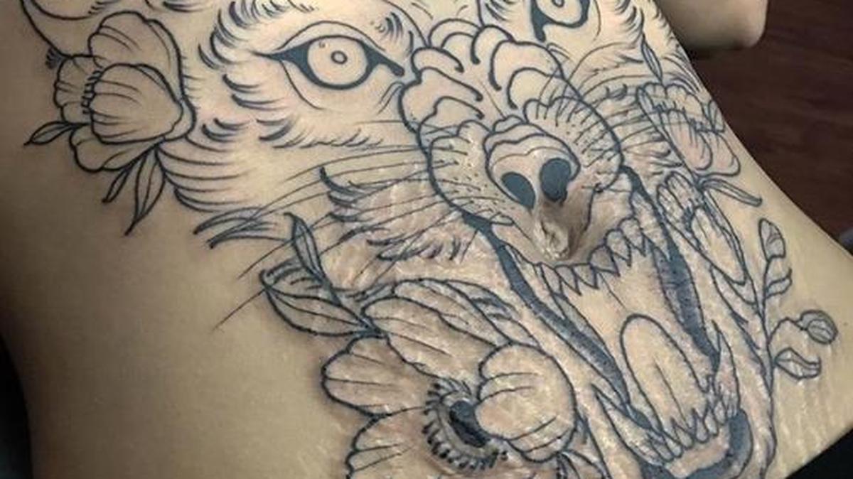 A Lemoore tattoo artist helps cover up a client’s stretch marks on her belly with a design of a wolf’s face. The design was posted on social media and gain close to 500 likes in the first couple of hours.