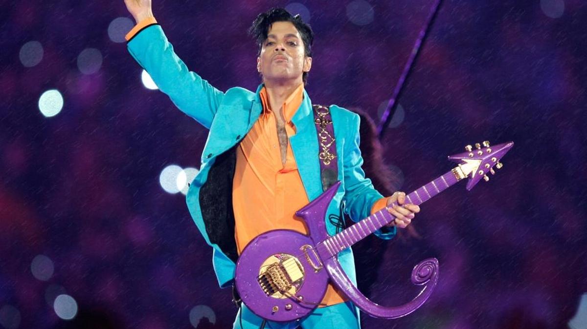 Prince performs during the halftime show at the Super Bowl XLI at Dolphin Stadium in Miami on Feb. 4, 2007. Prince was found dead at his home April 21, 2016, in suburban Minneapolis. He was 57.