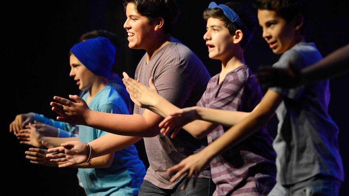 Cast members rehearse a scene from “13: The Musical” at the Veterans Memorial Auditorium. Play play runs through March 20.