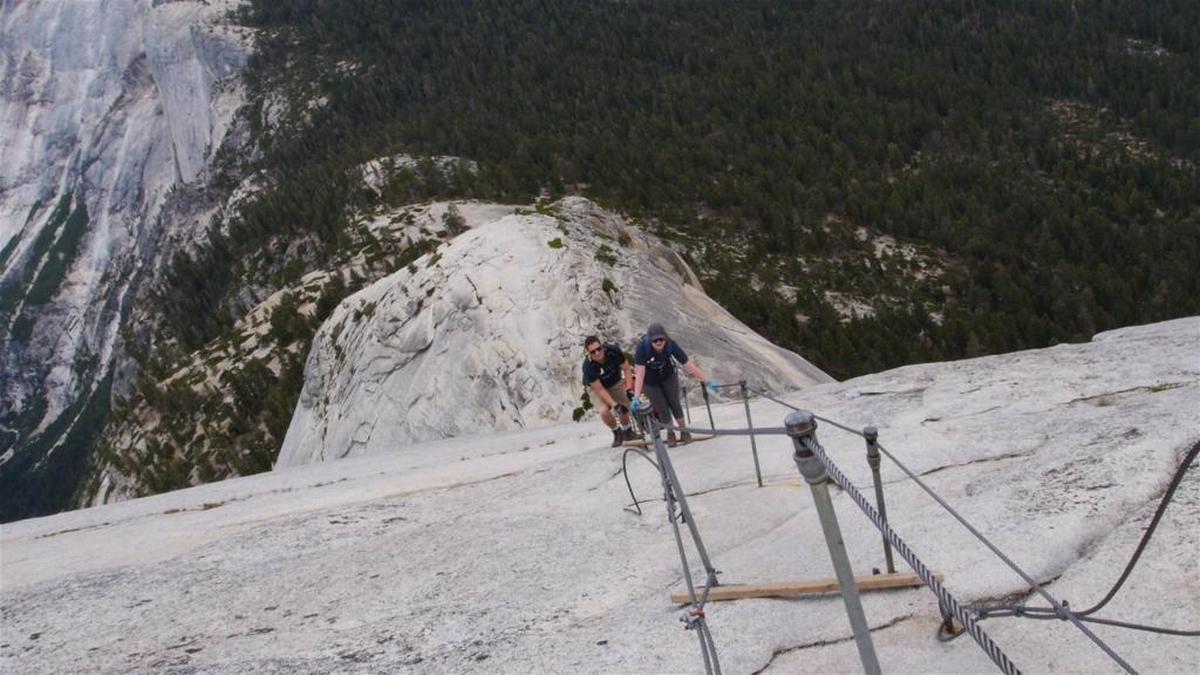 Climbers use the cables to ascend Half Dome in Yosemite National Park.