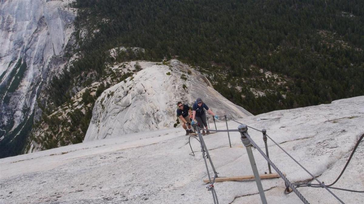Climbers use the cables to ascend Half Dome in Yosemite National Park. 