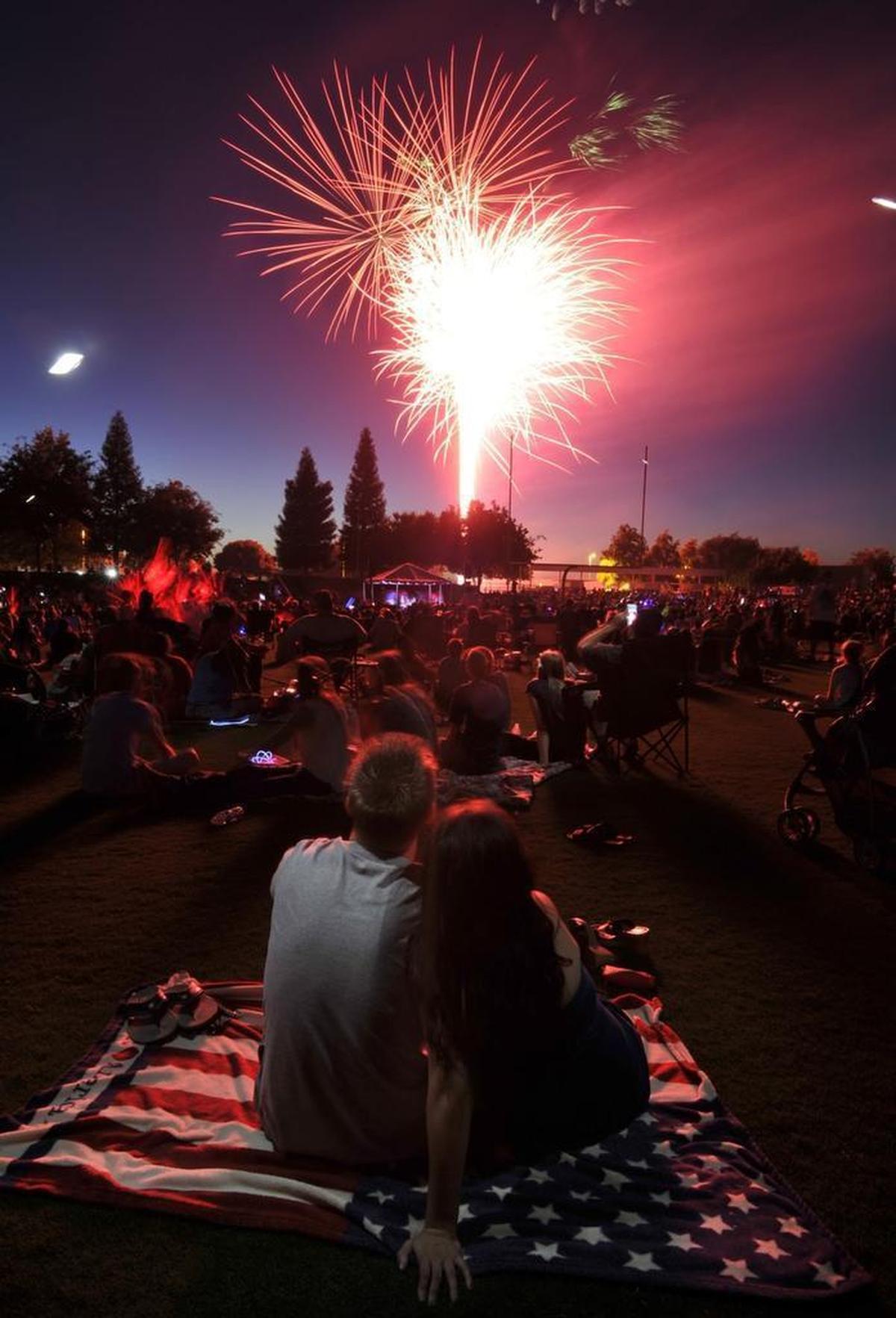 Fireworks explode at the 2014 Freedom Fest in Clovis.