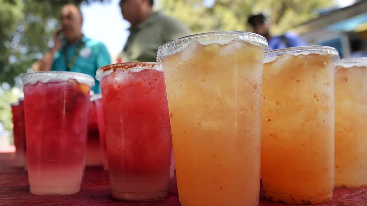 Aguas frescas, center, joins Hibiscus tea, far left, at Casa de Tamales during CartHop in downtown Fresno.