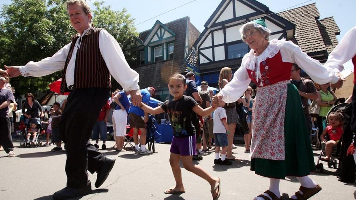 In this 2011 photo, Cecelia Alvarado, center, takes part in the folk dance at the Swedish Festival in Kingsburg. This year’s festival run through Sunday on Downtown Draper St.