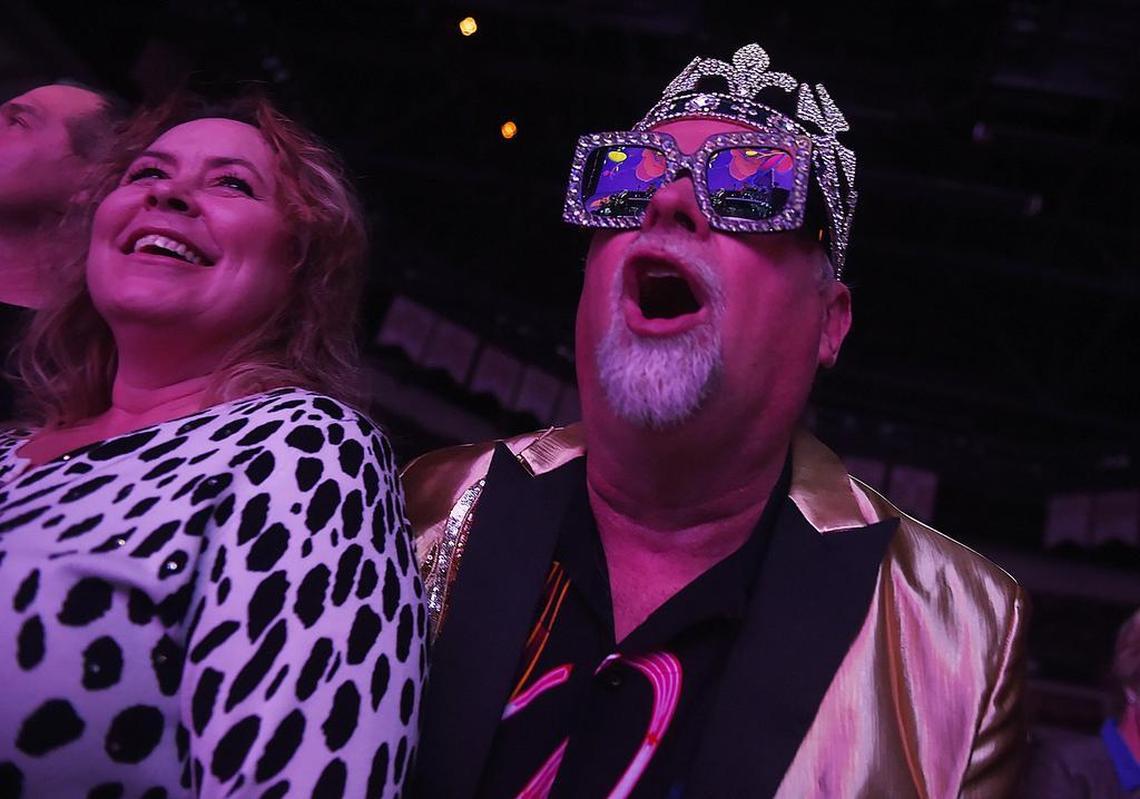 “Crazy Bernie” Siomiak, right, who says he has seen Elton John 25 times, watches as the superstar takes the stage to open the Farewell Yellow Brick Road tour appearance at the Save Mart Center on Tuesday night, Jan. 15, 2019 in Fresno. Siomiak owns Crazy Bernie Furniture in Fresno.