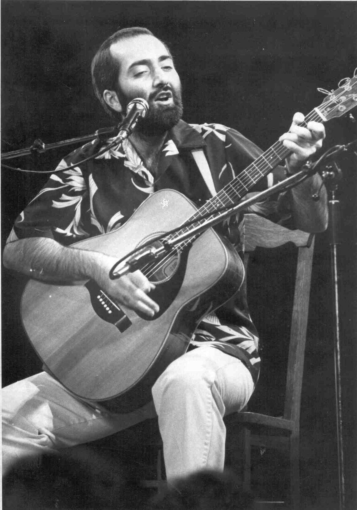 Raffi sings folk songs for children.