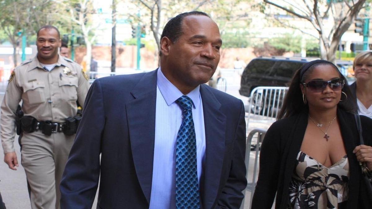 O.J. Simpson arrives for the start of closing arguments in his trial at the Clark County Regional Justice Center Thursday, October 2, 2008 with daughter Arnelle, right, in Las Vegas. USA Today reports that Arnelle lives in Fresno.