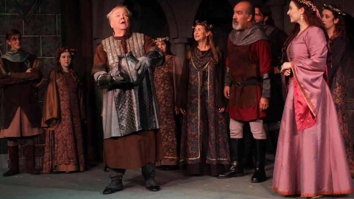 Jeff Dinmore, center, is a highlight as Pellinore in the Good Company Players production of ‘Camelot.’