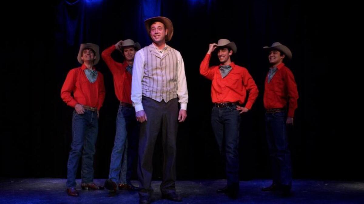 Ted Nunes, center, plays the title role in “The Will Rogers Follies” at Roger Rocka’s Dinner Theater.
