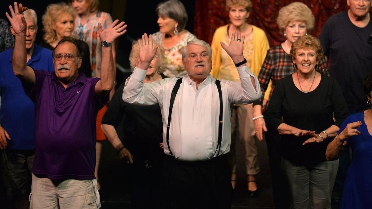 Michael Smith, center, 68, of Clovis, sings and dances during rehearsal of New Wrinkles, an annual production by senior citizens at Fresno City College. Performances continue through June 12.