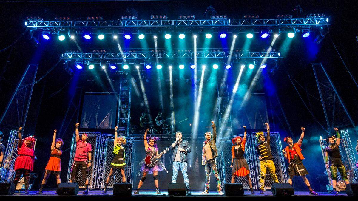 The cast of the Queen-inspired jukebox musical “We Will Rock You.”