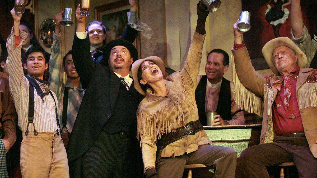 Louise Mandrell, seen rehearsing a scene for “Calamity Jane”  with members of the Good Company Players at Roger Rockas Dinner Theater in 2012, reprises here role in the musical. The show runs through Sept. 15.