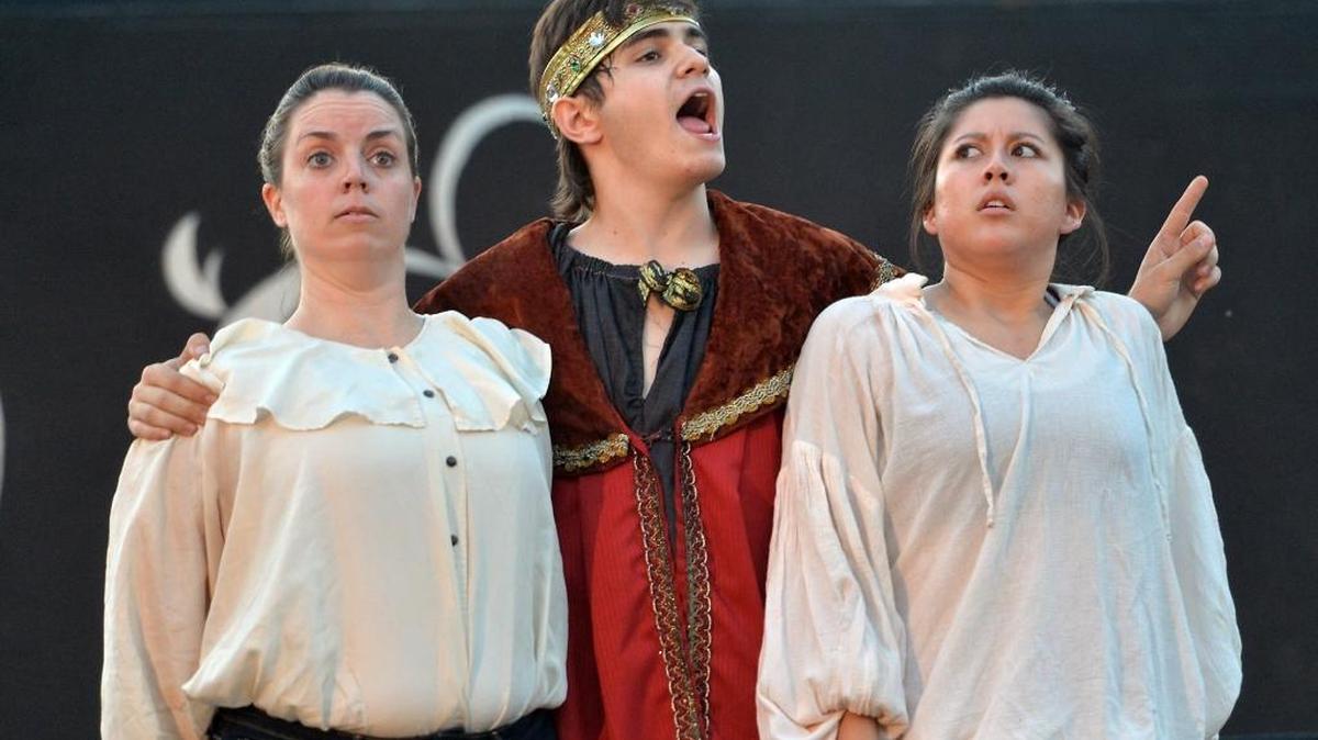 From left, Renee Newlove as “Rosencrantz”, Joshua Taber as “Claudius”, and Karina Rodriguez as “Guildenstern”, during rehearsal of Woodward Shakespeare’s “Rosencrantz and Guildenstern Are Dead,” at Woodward park in Fresno.