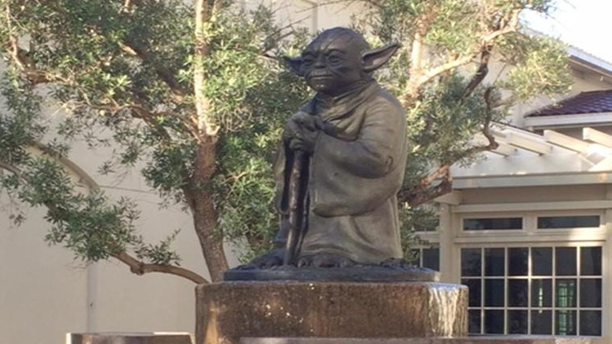 A Yoda fountain is outside the main doors at Industral Lights and Magic.