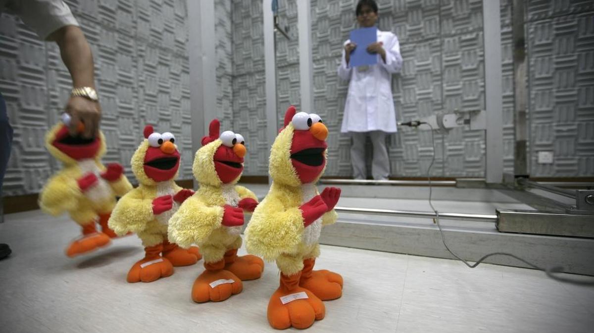 Boston Market customers can make like Elmo and do the Chicken Dance for a free cookie Friday. Here, Mattel toy lab technicians test the sound quality of Chicken Dance Elmo in 2007.