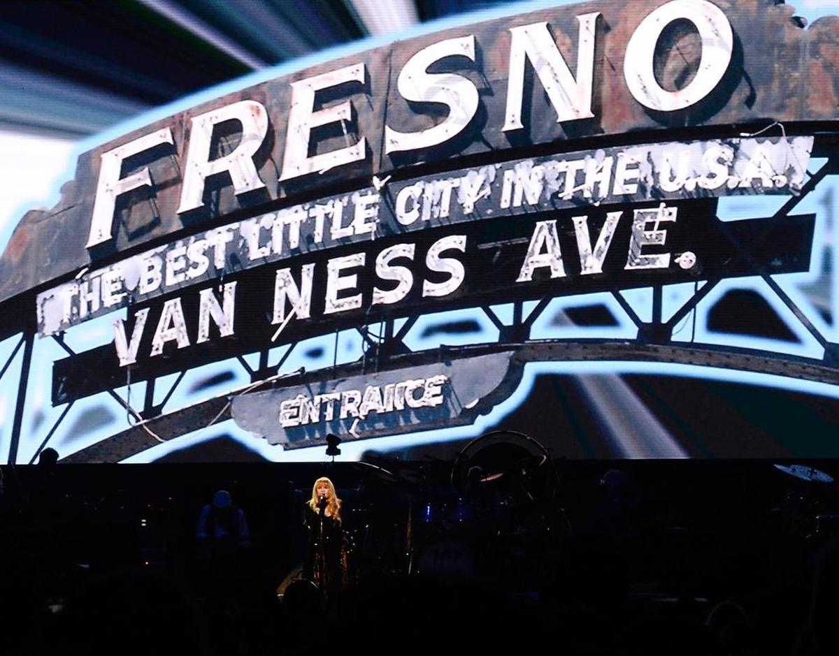 A giant image of the Fresno archway appears above vocalist Stevie Nicks of Fleetwood Mac as she performs with the band during their concert An Evening with Fleetwood Mac at the Save Mart Center in Fresno on Thursday, Dec. 6, 2018.