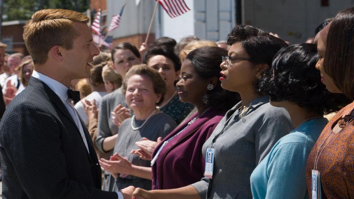 Katherine G. Johnson (Taraji P. Henson), flanked by fellow mathematicians Dorothy Vaughan (Octavia Spencer) and Mary Jackson (Janelle Mone) meet the man they helped send into orbit, John Glenn in “Hidden Figures.”