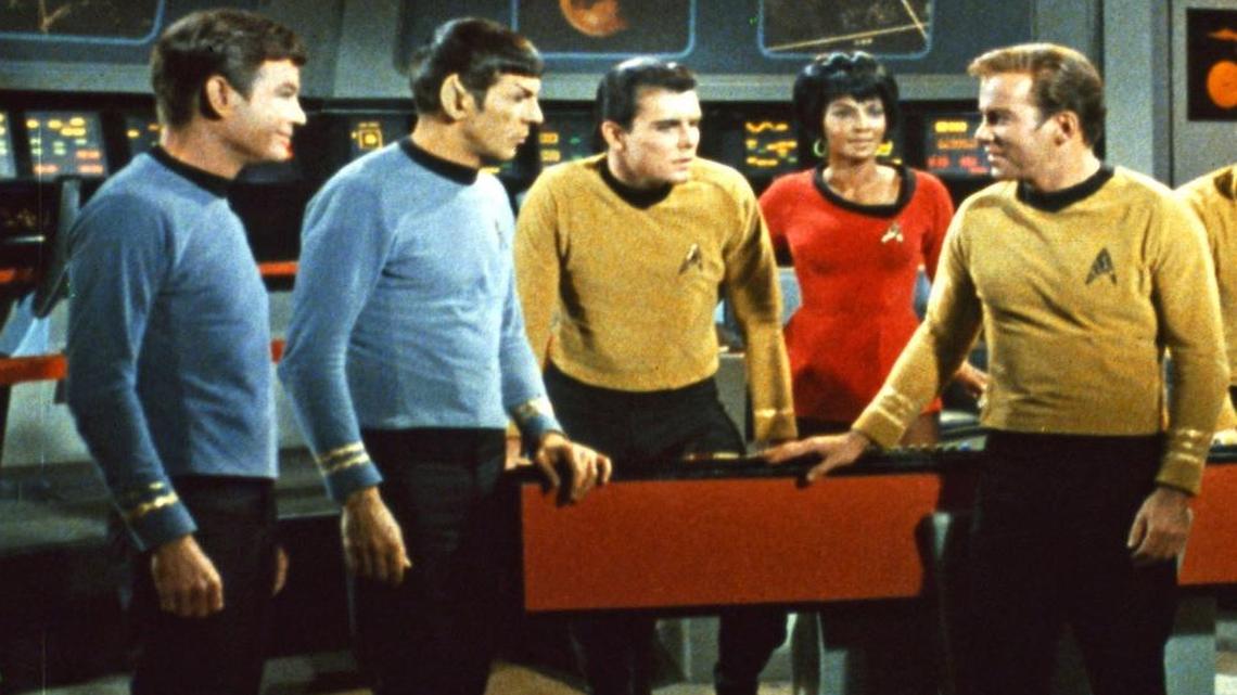 DeForest Kelley, Leonard Nimoy, Nichelle Nichols, and William Shatner appear in a scene from the TV series “Star Trek.”
