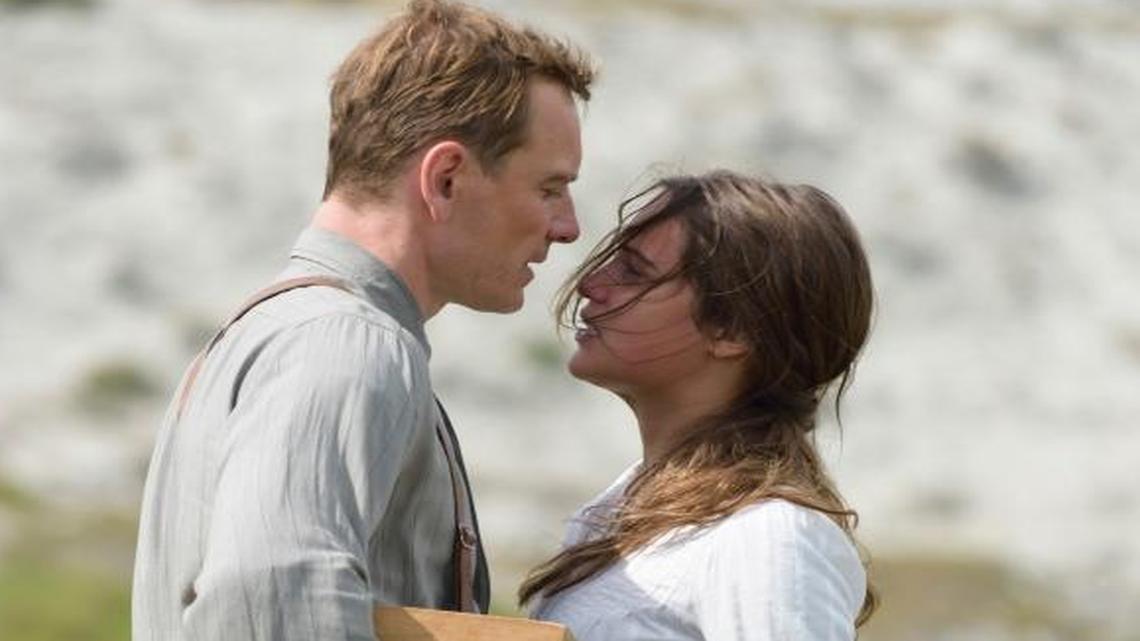 Michael Fassbender stars as Tom Sherbourne and Alicia Vikander as his wife Isabel in “The Light Between Oceans.”