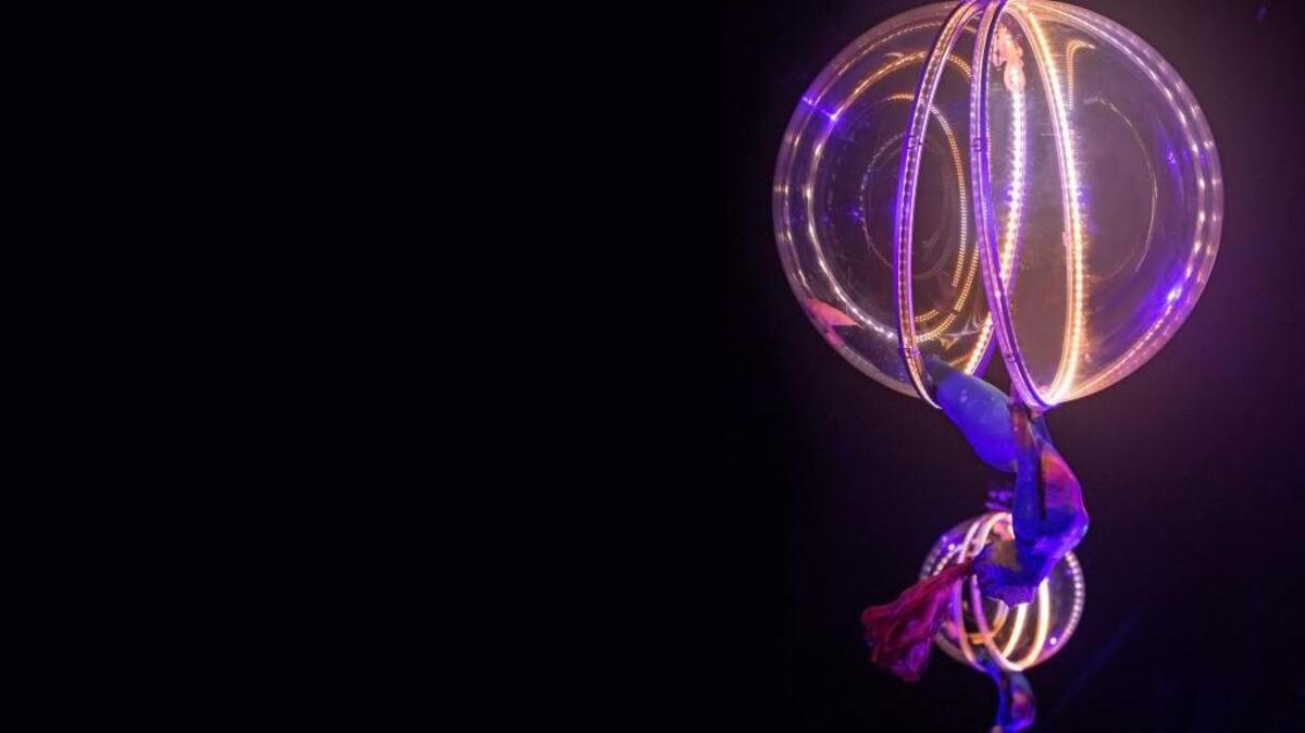 The globe aerial act takes on a space-age look.