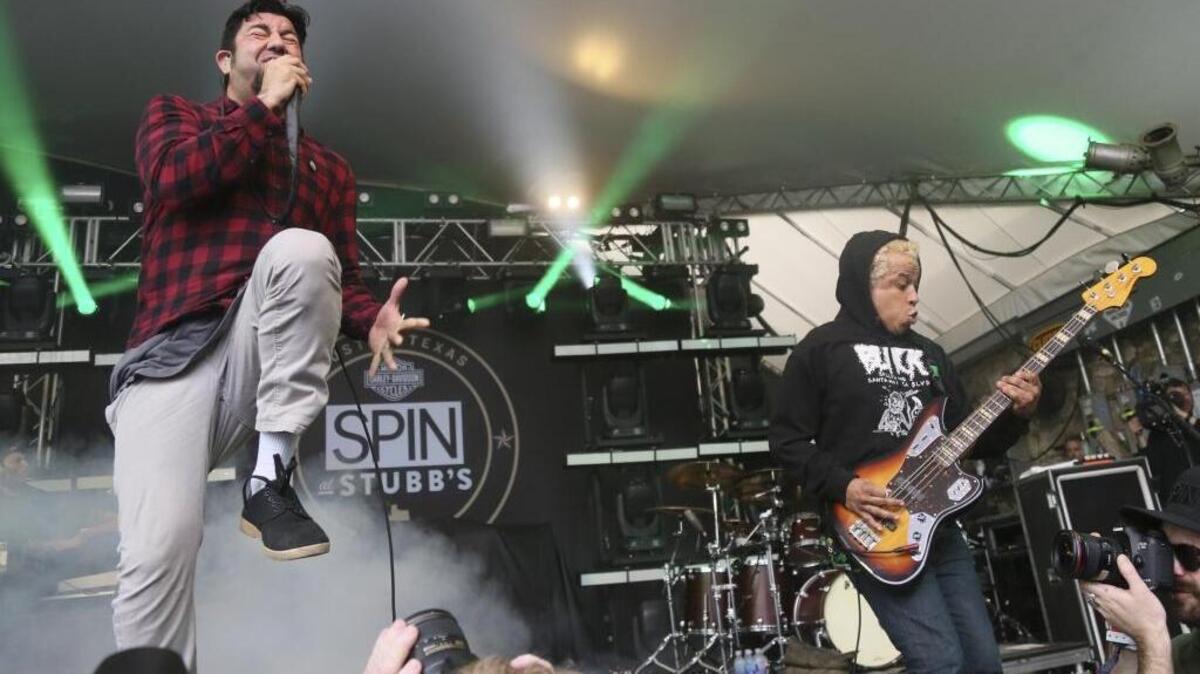 Deftones, with Chino Moreno, left, and Sergio Vega.