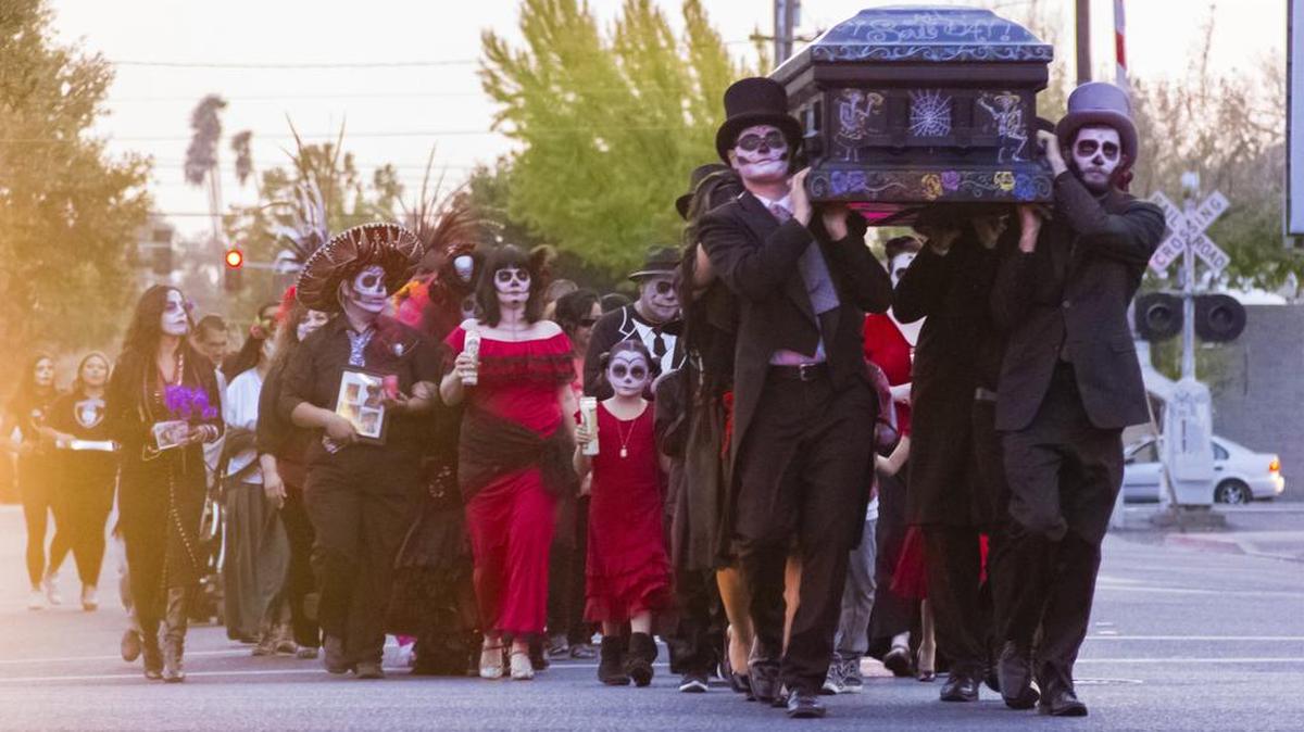 Franlin and Down Funeral Home lead the LCR third annual Día de los Muertos procession.