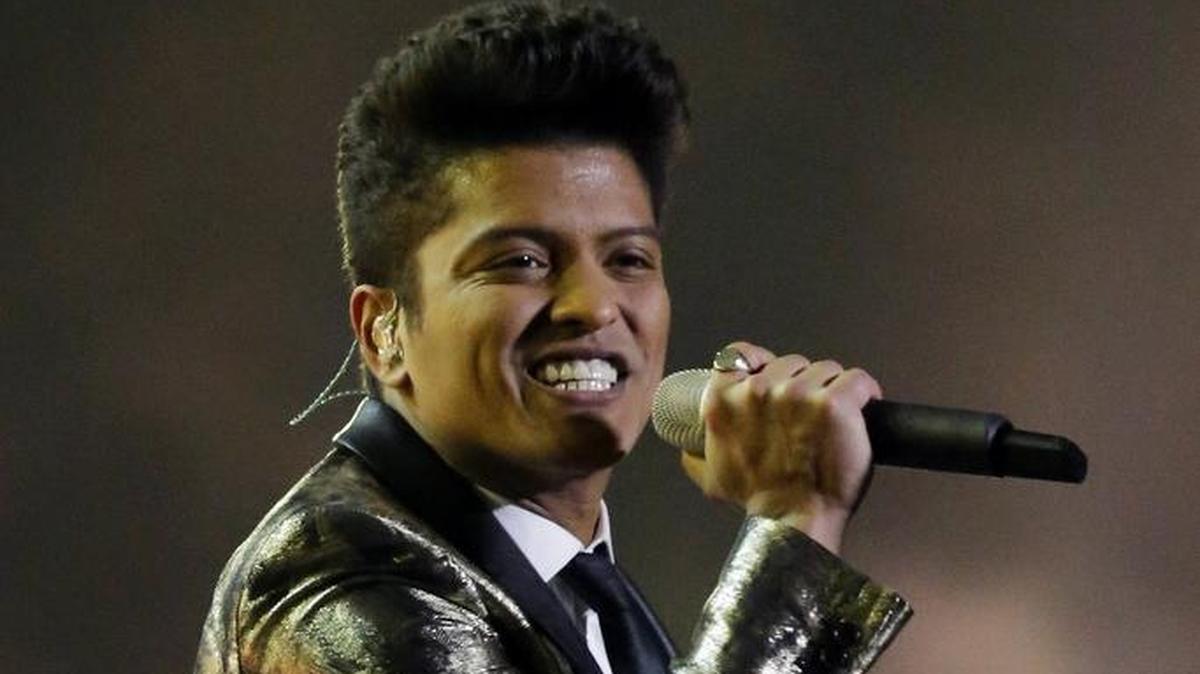 Bruno Mars performs during the halftime show of the NFL Super Bowl XLVIII football game in 2014. The pop star is bringing his 24K Magic World Tour to Fresno on Thursday, Nov. 2, 2017.
