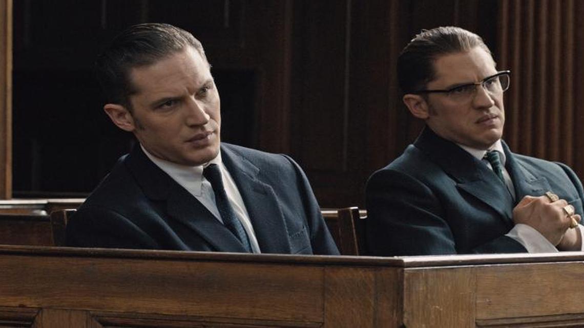 (L to R) Reggie and Ronnie Kray (Tom Hardy) in “Legend.”