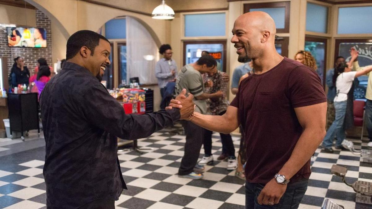 Ice Cube (left) and Common in “Barbershop: The Next Cut.”