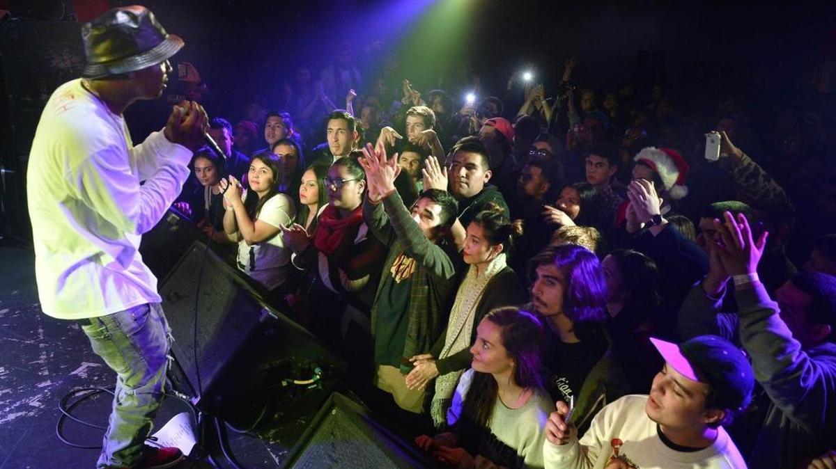 An enthusiastic crowd at Strummer’s in the Tower District watch hip-hopper Fashawn perform on Dec. 23, 2014. The rapper returns to the venue on Wednesday, Dec. 23, for his second Beary X-Mas show.