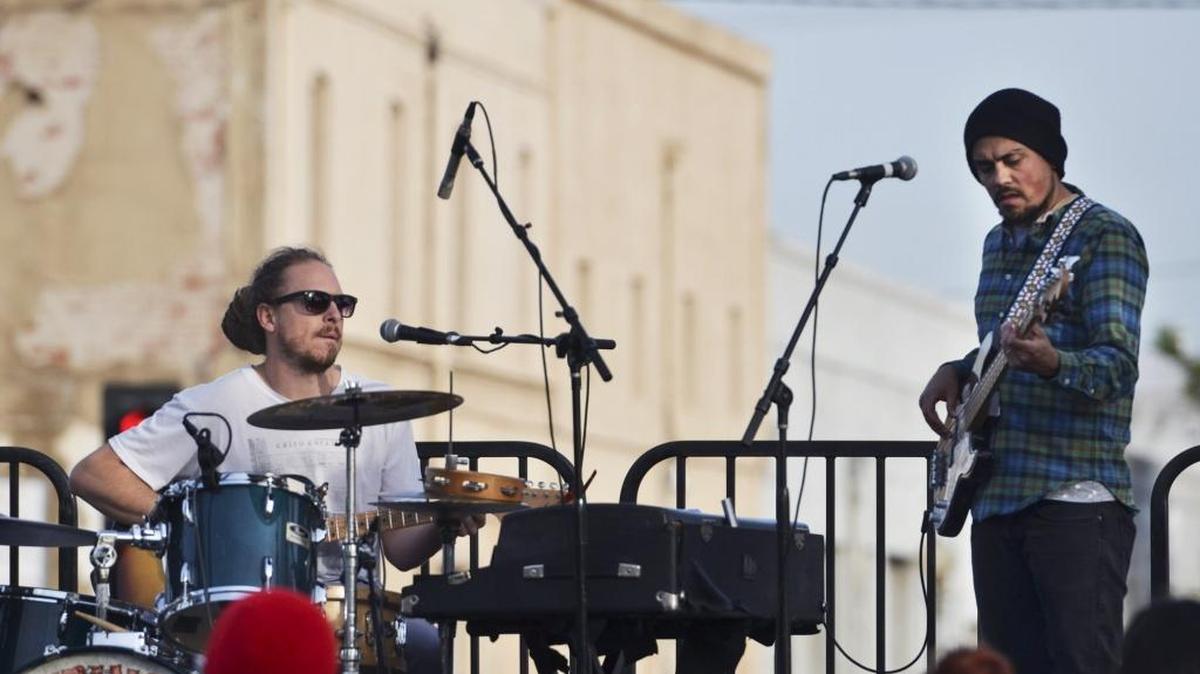 Strange Vine’s Ian Blesse, left, and Toby Cordova, right, perform at the H Street Festival earlier this year. The band plays a fundraiser for the Fire Squad Fresno Saturday, Dec. 26 at Strummer’s.