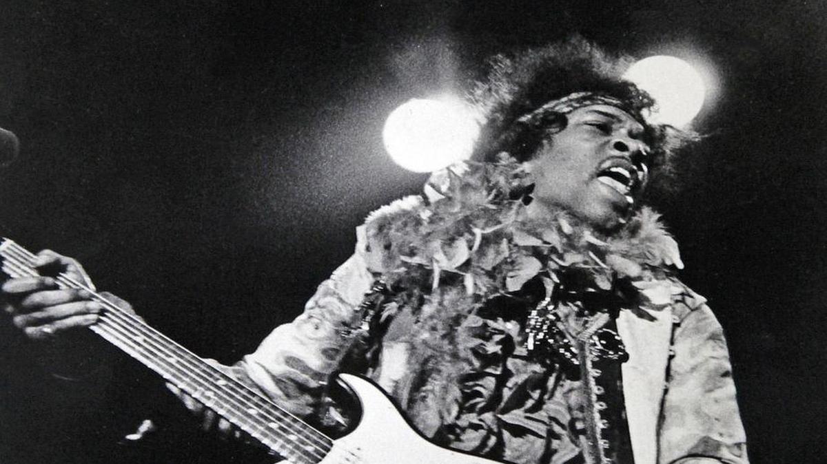 FILE - In this June 18, 1967 file photo, Jimi Hendrix performs at the Monterey Pop Festival in Monterey, Calif. Before Burning Man and Bonnaroo, Coachella and Lollapalooza, Glastonbury and Governors Island, there was Monterey Pop. The festival gets a 50th anniversary celebration June 16-18.
