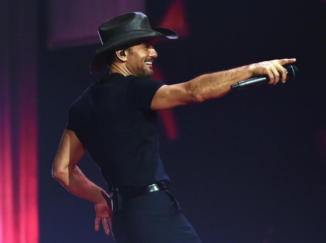 Tim McGraw points to the audience as he perform on the Soul2Soul World Tour 2017 with his wife Faith Hill at Save Mart Center Friday, Sept. 29, 2017 in Fresno.