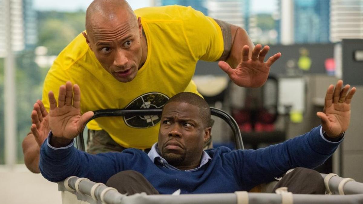 Kevin Hart, bottom, and Dwayne Johnson star in “Central Intelligence.”
