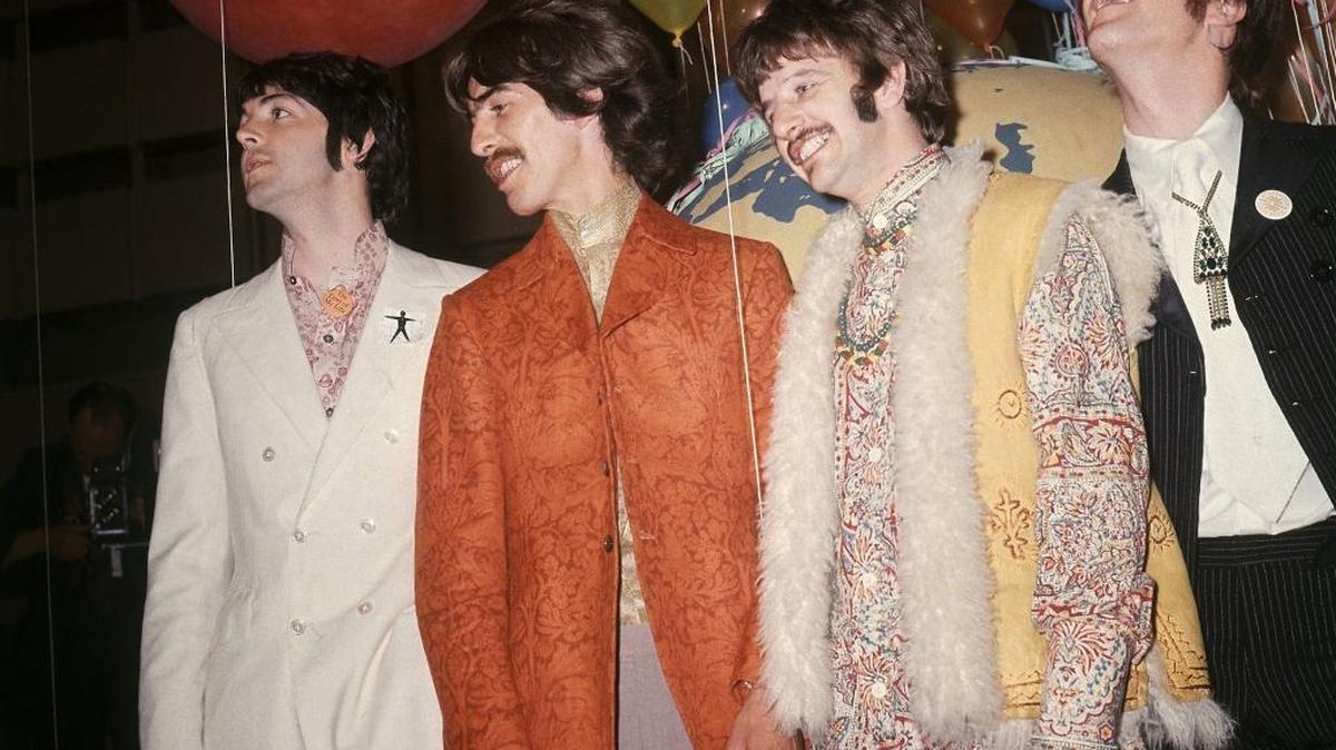 In this June 1967 file photo, Paul McCartney, from left, George Harrison, Ringo Starr and John Lennon of The Beatles appear backstage during a break in rehearsals for the live broadcast on the “Our World” program at EMI studios in London. Half a century after The Beatles sychedelic landmark, “Sgt. Pepper’s Lonely Hearts Club Band” album, it stands as just one of many musical pieces of 1967 that shaped what we listen to now. Tribute band The Fab will perform the album at Tower Theatre.