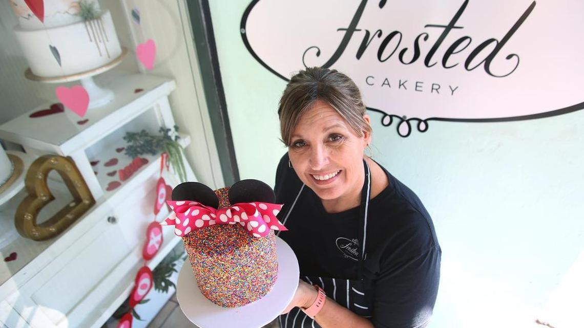 Owner Beverly Gable holds a fancy cake creation at her Frosted Cakery business, a People’s Choice winner in the Cupcake Shop category.