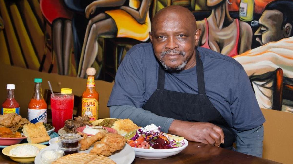 CHEF PAUL’S CAFE: Chef Paul Pearson is developing a loyal following with dishes like chicken and waffles, greens and grits.