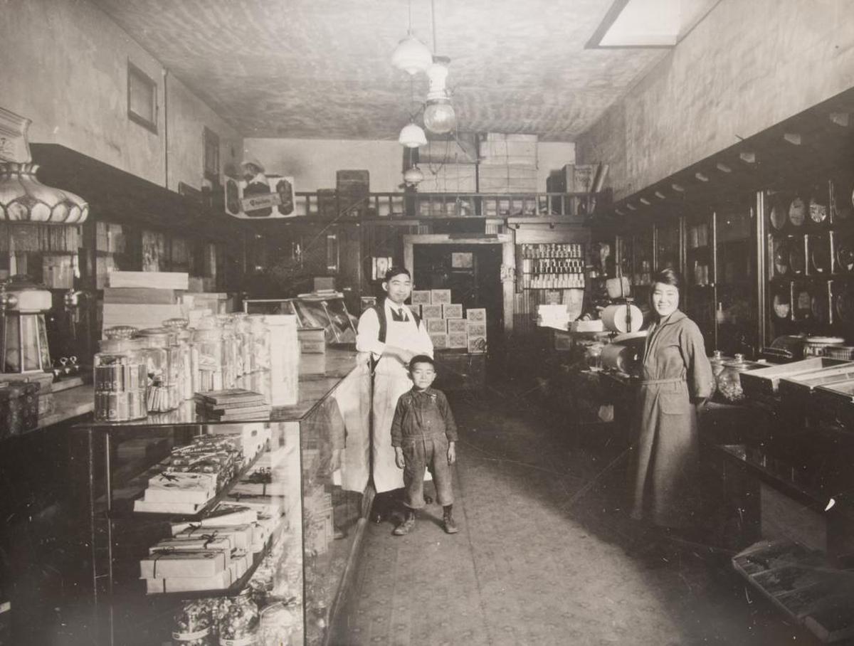 Kogetsu-Do has a long history in Fresno’s Chinatown. This picture from 1920 shows Sugimatsu Ikeda, grandfather, Sakino Ikeda, grandmother, and Roy Ikeda, uncle of its current owner, Lynn Ikeda.