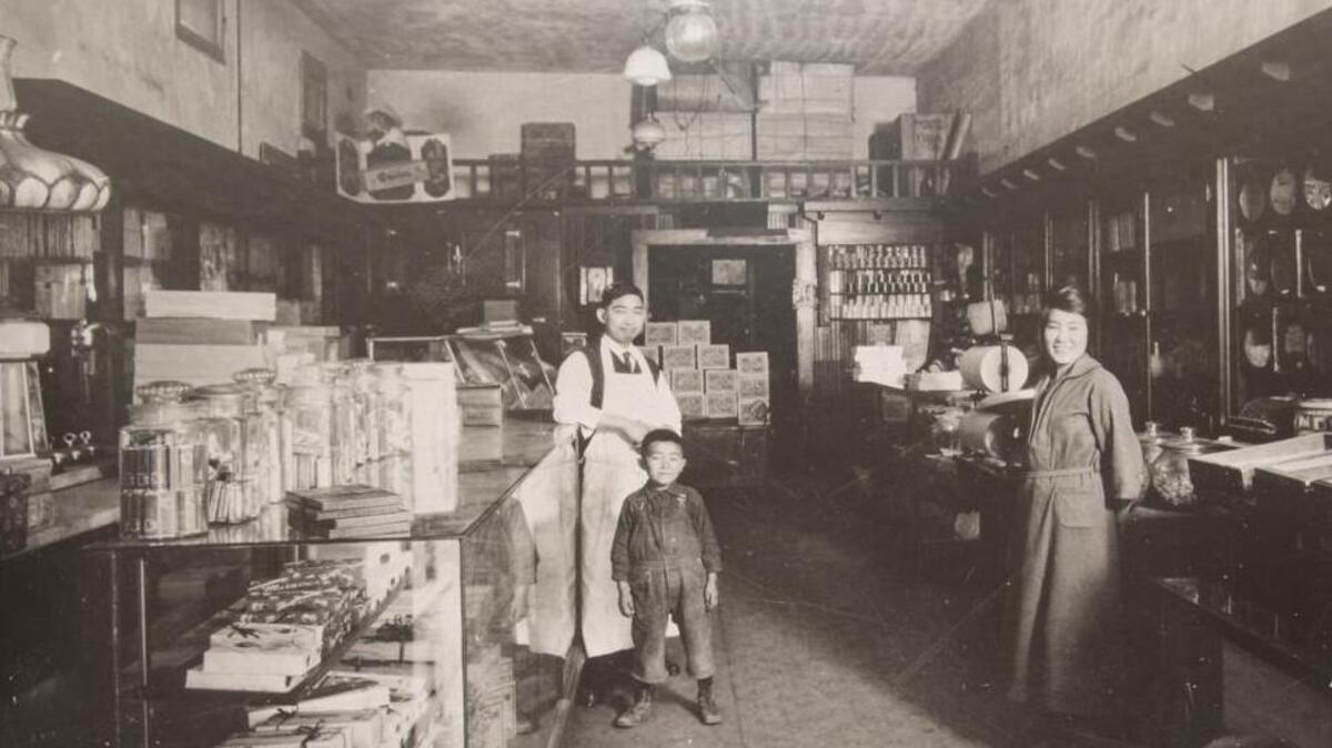 Kogetsu-Do has a long history in Fresno’s Chinatown. This picture from 1920 shows Sugimatsu Ikeda, grandfather, Sakino Ikeda, grandmother, and Roy Ikeda, uncle of its current owner, Lynn Ikeda.