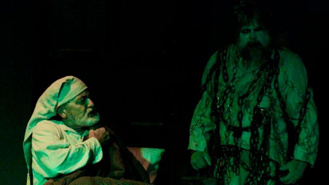 Scrooge gets a visit from a Christmas ghost in “A Christmas Carol.” The Good Company Players production of the holiday classic opens Friday and continues through Dec. 23.
