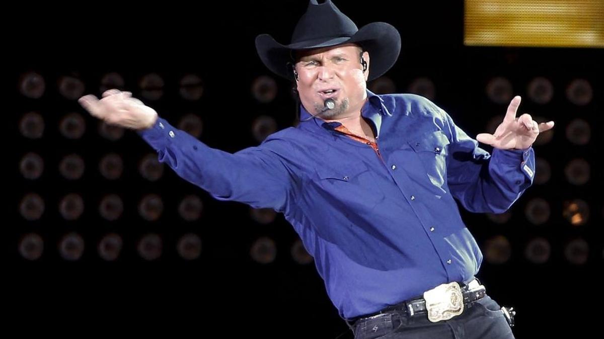Garth Brooks sings “Ain’t Going Down” for his opening song during a performance at Yankee Stadium, Friday, July 8, 2016, in New York. He will perform in Fresno Sept. 23-25 at the Save Mart Center.