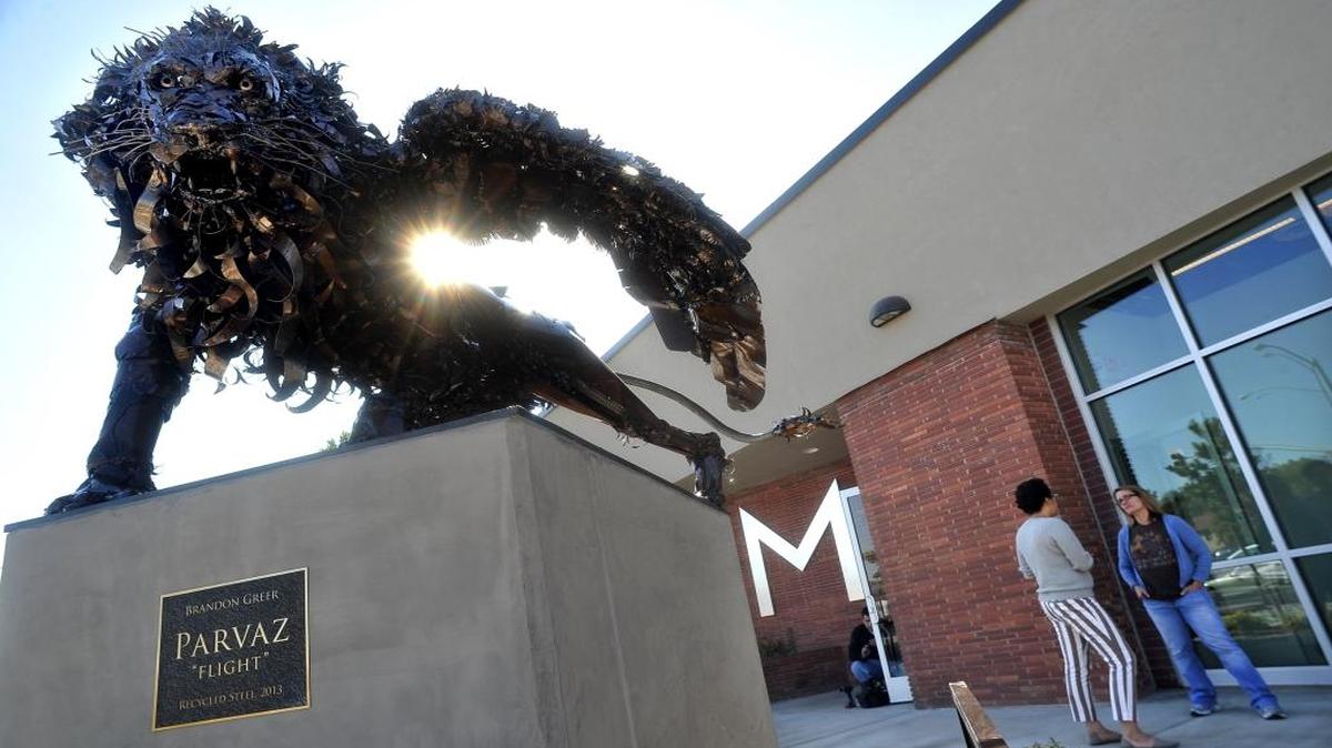 Parvaz (Flight) by Brandon Greer, a winged-lion sculpture made of recycled steel, stands outside the M Street Arts Complex, a collaboration between local artists and Fresno homebuilder Darius Assemi of Granville. The venue is one of many hosts for ArtHop tonight.
