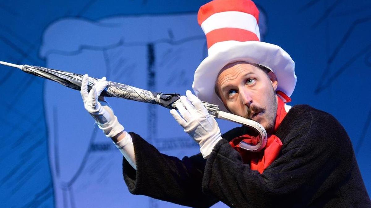 Adam Meredith performs as The Cat in the Hat in “The Cat in the Hat” during a rehearsal at the Fresno City College Theatre.