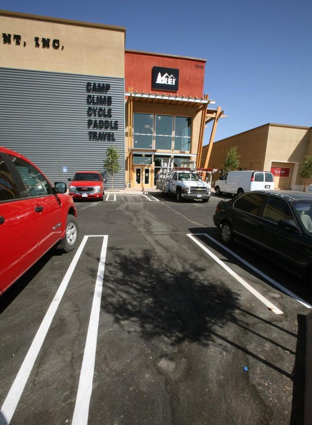 REI Co-op hosts a bike maintenance class at its River Park store in Fresno in 2016. The retailer plans to open an Elk Grove location in 2025.