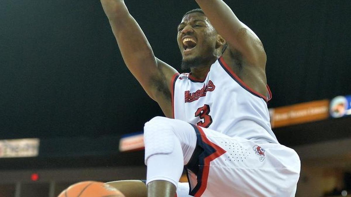 Fresno State’s Paul Watson scores against Boise State during a game at Save Mart Center on Jan. 14.